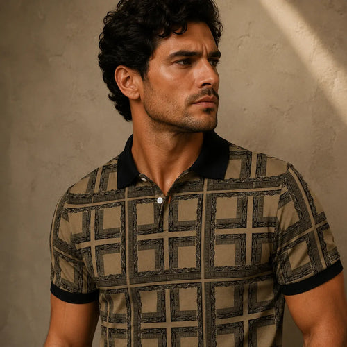Man wearing a patterned polo shirt against a beige wall