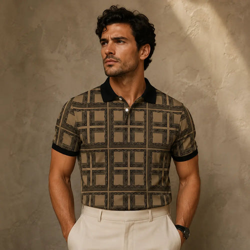 Man wearing a patterned shirt and white pants against a textured beige wall