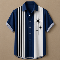 A short-sleeve button-up shirt laid flat on a tan background. The shirt is navy blue with a vertical white stripe on the right side, black vertical stripes on the left side, and black starburst graphics on the white stripe.