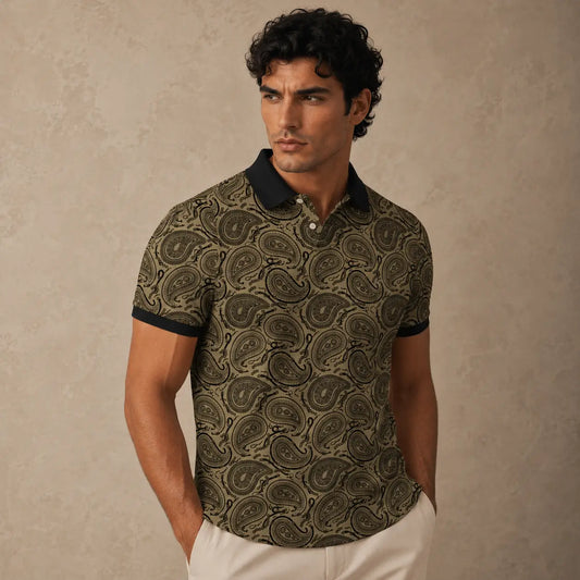 Man wearing a patterned polo shirt against a beige background