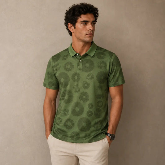 Man wearing a green patterned polo shirt against a beige background