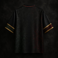 Dark textured shirt with gold accents on a dark background