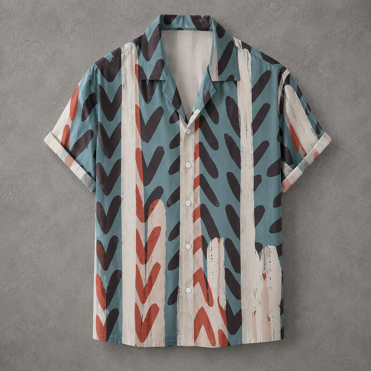 A short-sleeve button-up camp shirt with a retro abstract pattern of vertical stripes in teal, cream, rust red, and dark charcoal, displayed flat against a textured gray background.