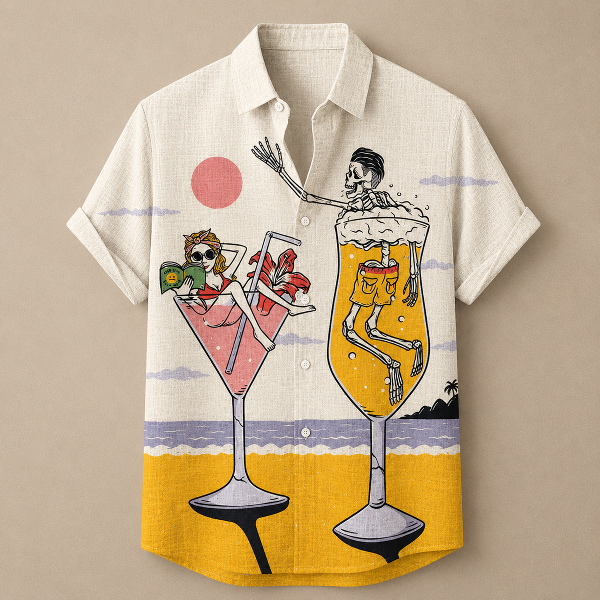 A short-sleeve button-up shirt in a warm off-white/cream color, featuring a colorful graphic print of two cartoon skeletons in cocktail glasses on a beach background.