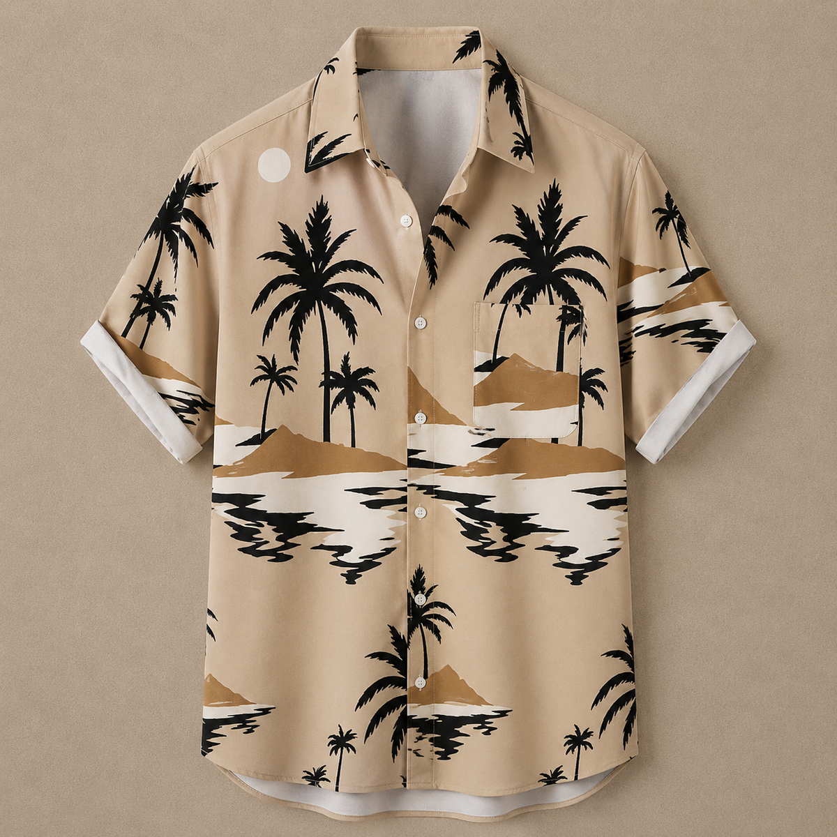 A beige short-sleeve button-up shirt with a tropical print of black palm trees, white water, and tan sand dunes, shown against a solid beige background.