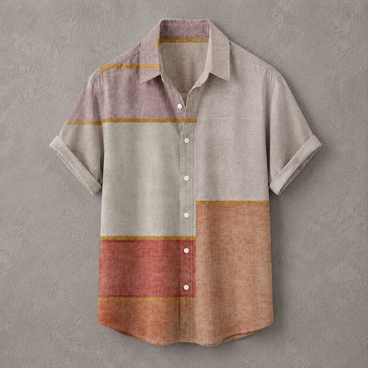 A short-sleeve button-up shirt with a textured linen-like finish, featuring a color-blocked pattern in beige, dusty pink, terracotta, and rust orange with thin mustard yellow stripes, displayed against a textured gray background.
