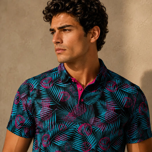 Man wearing a patterned shirt against a beige wall